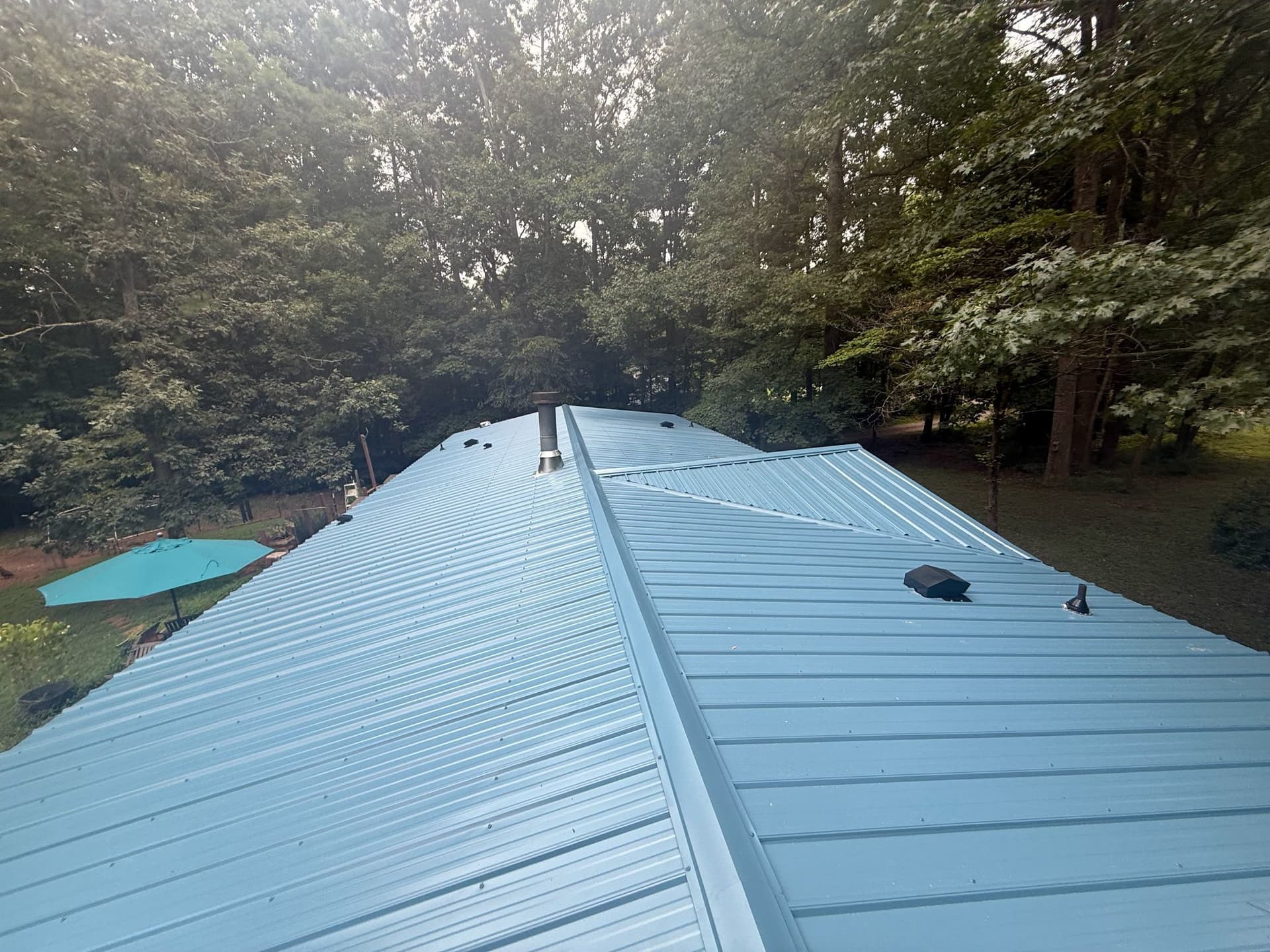 Durable Blue Metal Roof Installed in Durham image