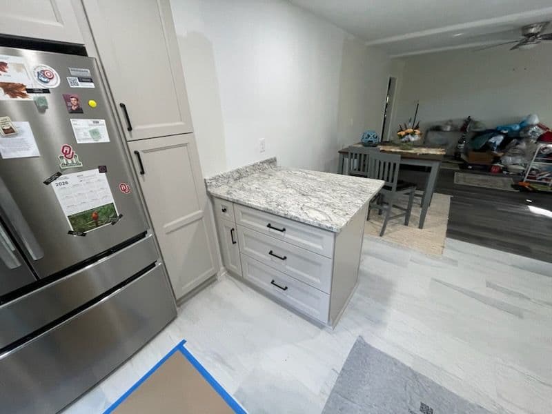 Project Light Gray Kitchen Cabinets and Granite Countertops Transformation image