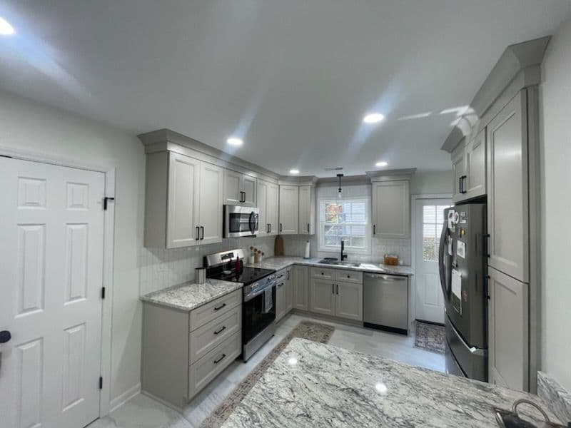 Gallery photos for Stunning Kitchen Remodel with Light Gray Cabinets and Granite Countertops: Image #2